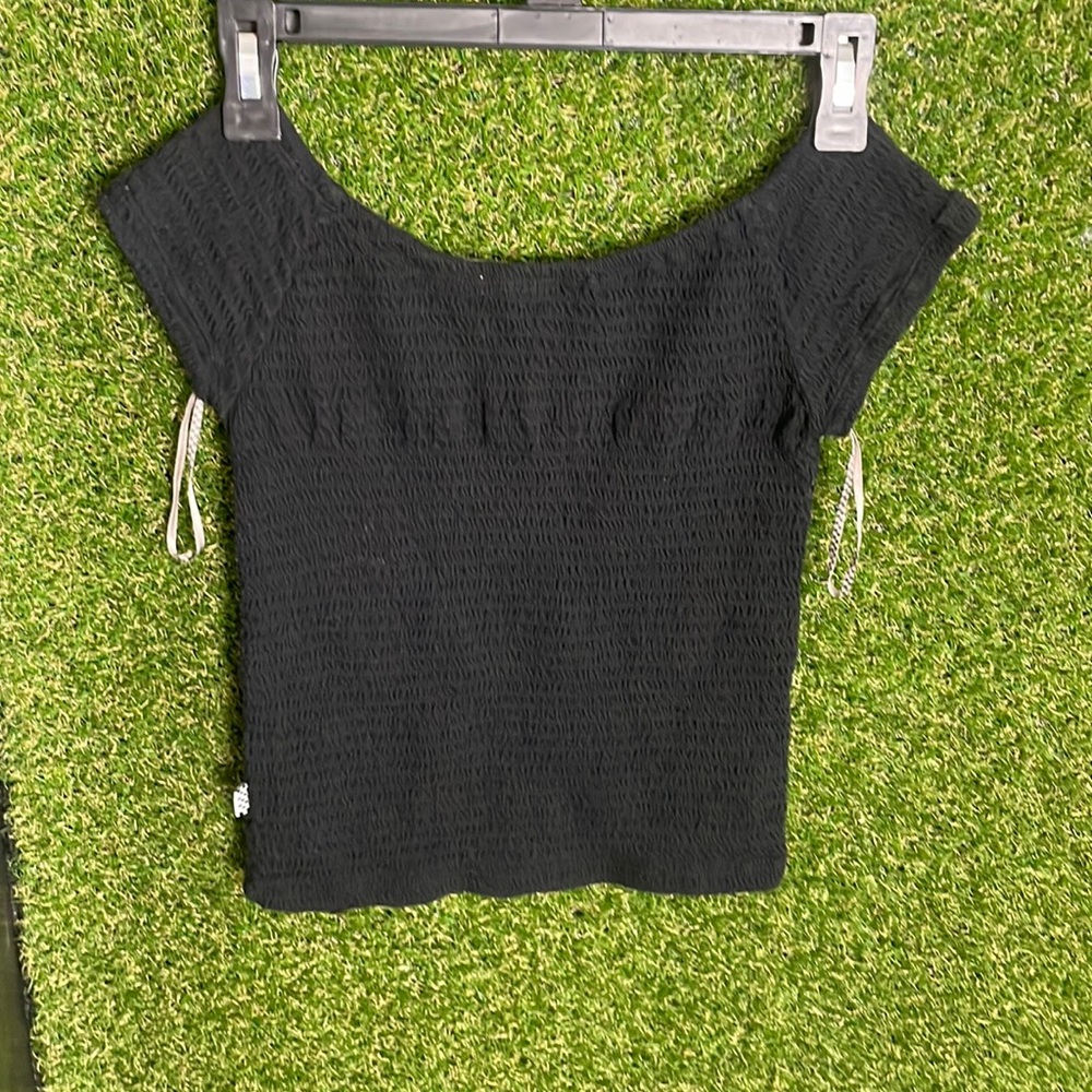 From vans ,size medium,black off the shoulders crop top.